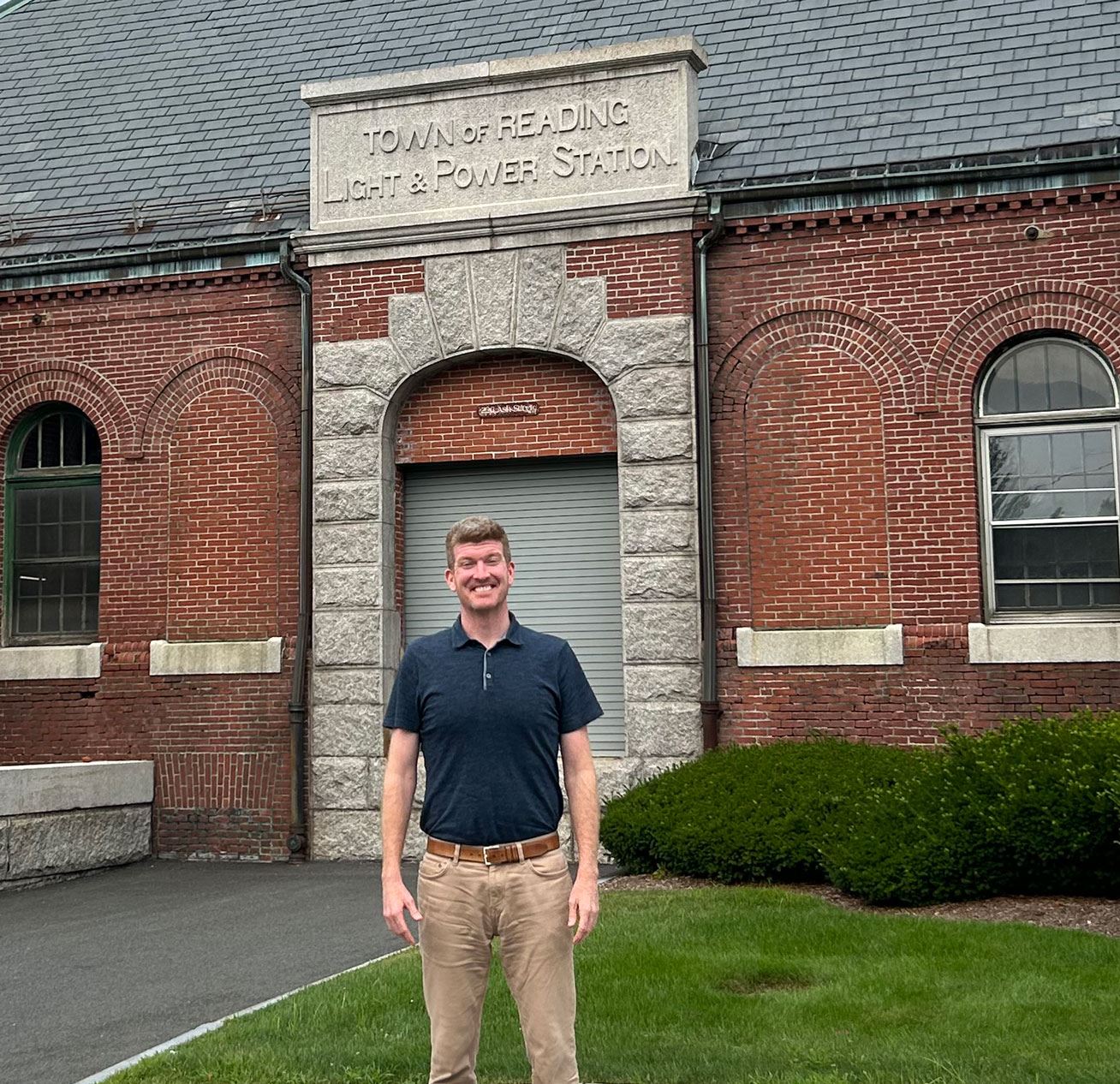 Image of RMLD Customer Adam Quinn in front of RMLD Station 1